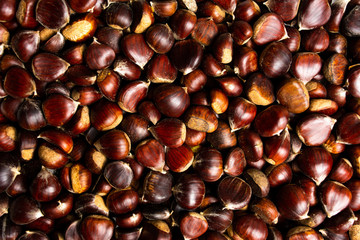 Chestnuts on a pile making background