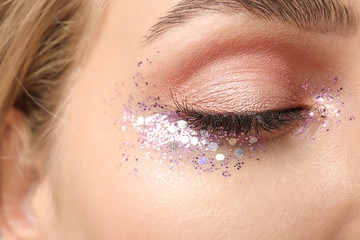 Young woman with beautiful makeup, closeup