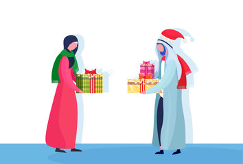Arabic couple giving present each other happy