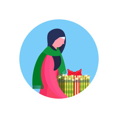 Arab woman traditional clothes hold gift box