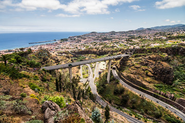 Fototapeta na wymiar Funchal, Madeira - July, 2018. Madeira island Portugal typical landscape, Funchal city panorama view from botanical garden