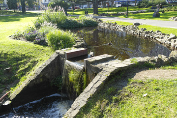 bridge in city garden riga