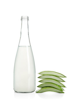 Bottle with fresh aloe vera juice on white background