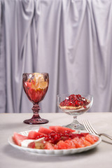 Plate with delicious watermelon salad on table
