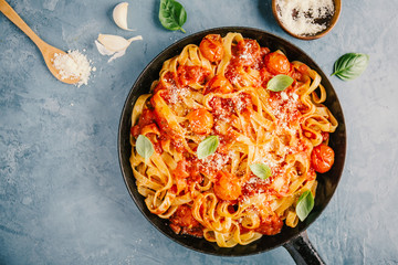 Tomato sauce spaghetti pasta on pan