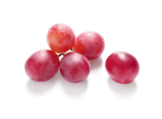 Ripe grapes on white background
