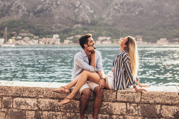 Couple in love, enjoying the summer time by the sea.