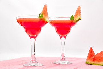 Watermelon margarita cocktail on white background. Fresh watermelon lemonade