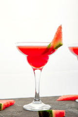 Watermelon margarita cocktail on white background. Fresh watermelon lemonade