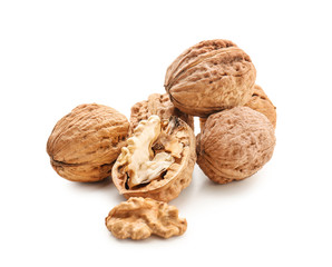 Tasty walnuts on white background