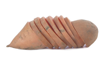 heap of slices of sweet potato isolated on white background