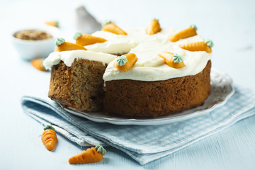 Homemade carrot cake with marzipan carrots