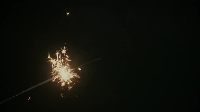 Sparklers on a black background.
You can easily key out the background, or use soft light/overlay blending mode for adding to your composition.