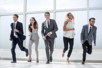 in full growth.young business team walking together.