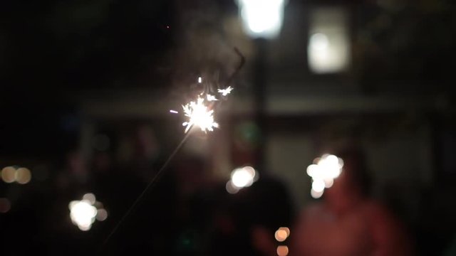 Sparkler flame close up outside night.mov