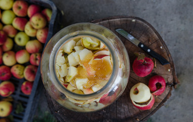 Making of apple - from above scene of a working station