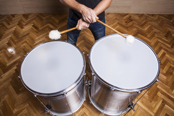 percussionist practicing with two drums