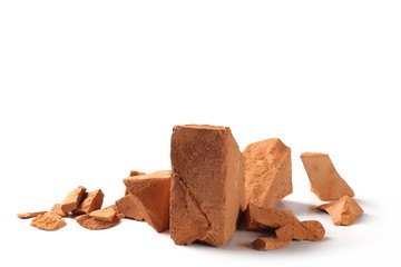 Shattered bricks isolated on white background