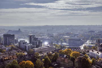 Obraz premium Lithuania, Vilnius cityscape in foggy autumn day