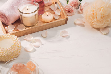 Obraz na płótnie Canvas Spa and aromatherapy. Rose flower and essential oil.