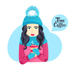 Beautiful young girl in a winter hat with a fluffy pompon and in a scarf holding a cup of hot coffee.