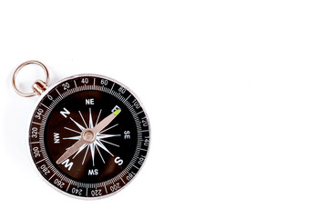 compass on white background concept - direction motion top view