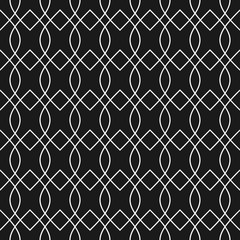 Fototapeta premium Abstract geometric seamless pattern with intersecting petal shapes in black and white