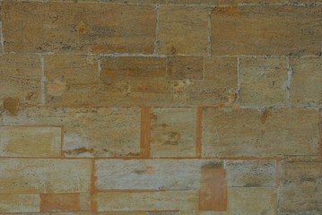 brown stone texture of large bricks in the wall