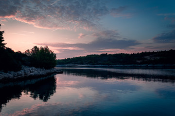 Sunrise over cal bay. Still water and sleeping nature