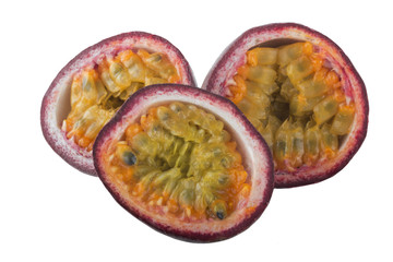 halves of passion fruit isolated on white background