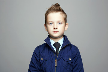 fashionable blue eyed boy. fashion hairstyle child