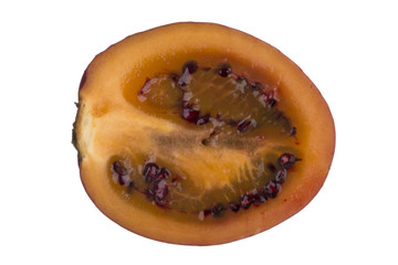 half of tamarillo isolated on white background