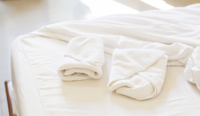 white beach towel in bedroom