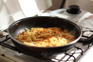 Iron pan with braised cabbage, horizontal shot