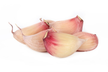 heap of fresh garlic isolated on white background