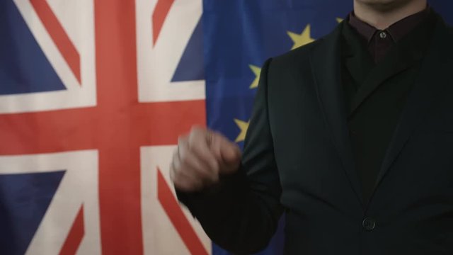 Close Up of Trade Negotiator Performing Swipes with Finger and Shows a Positive Gesture