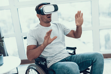 Handicapped Man in Wheelchair Wearing VR Headset