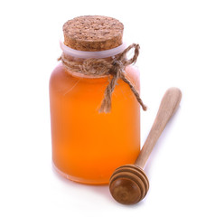 honey in jar on white background