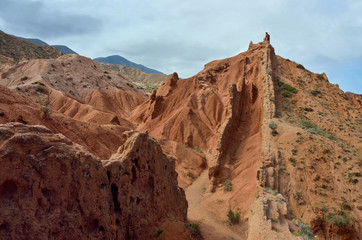 Colourful red rock formations of Skazka (Fairy tale) canyon,Issyk-Kul lake,Kyrgyzstan,Central Asia
