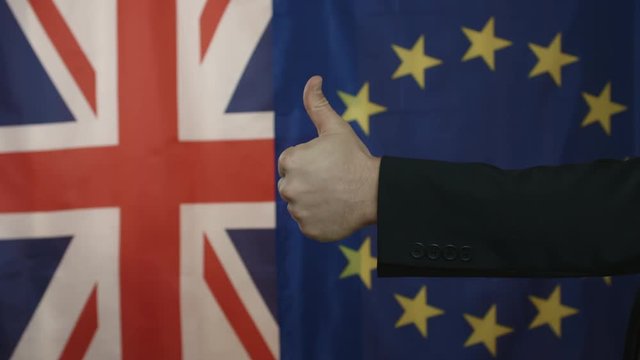 Handshake with Positive Gestures Between British and European Officials