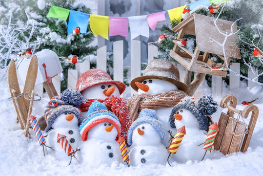 Postcard with Christmas and a new year with cute snowmen