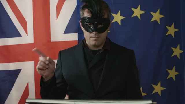 Masked Trade Negotiator Points At Documentation and Shows Negative Gesture