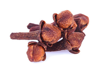 dry cloves on white background