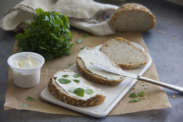 Whole Grain Sandwiches with Soft Cream Cheese and Greens