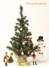 Musicians playing by decorated Christmas Tree