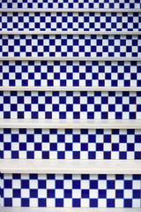 Blue and White checked marble stairs