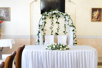 Colour photo of a wedding table for the newlyweds