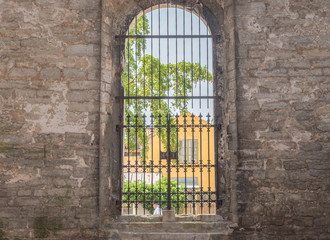 old gate in stone wall