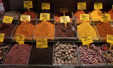 diversity of spices at east market with labels