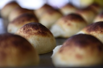 Close up view of fresh baked Colombian cheese bread, or Pandebono in Colombia, South America